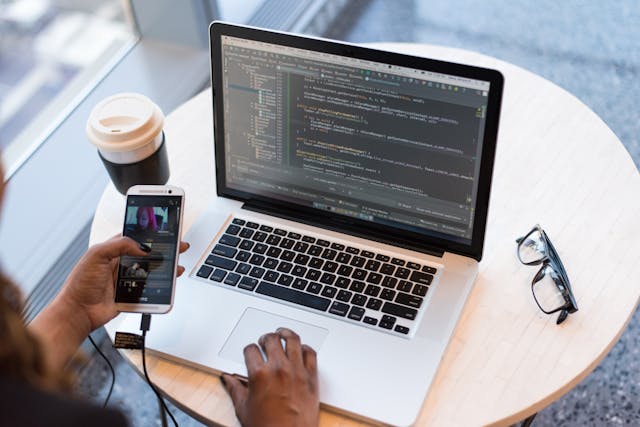 Showit vs Squarespace designers using laptop